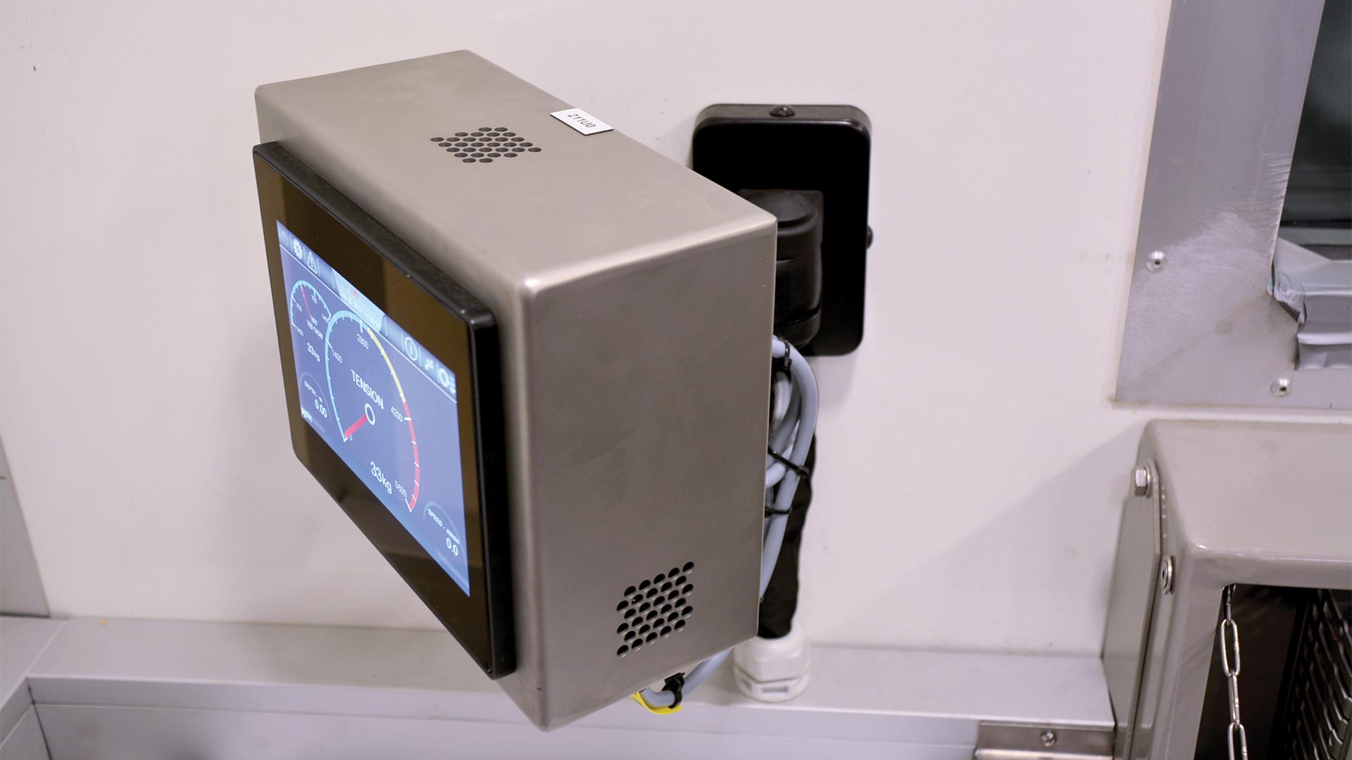 A LineMinder Touchscreen Panels for Wireline Units in a box unit facing left