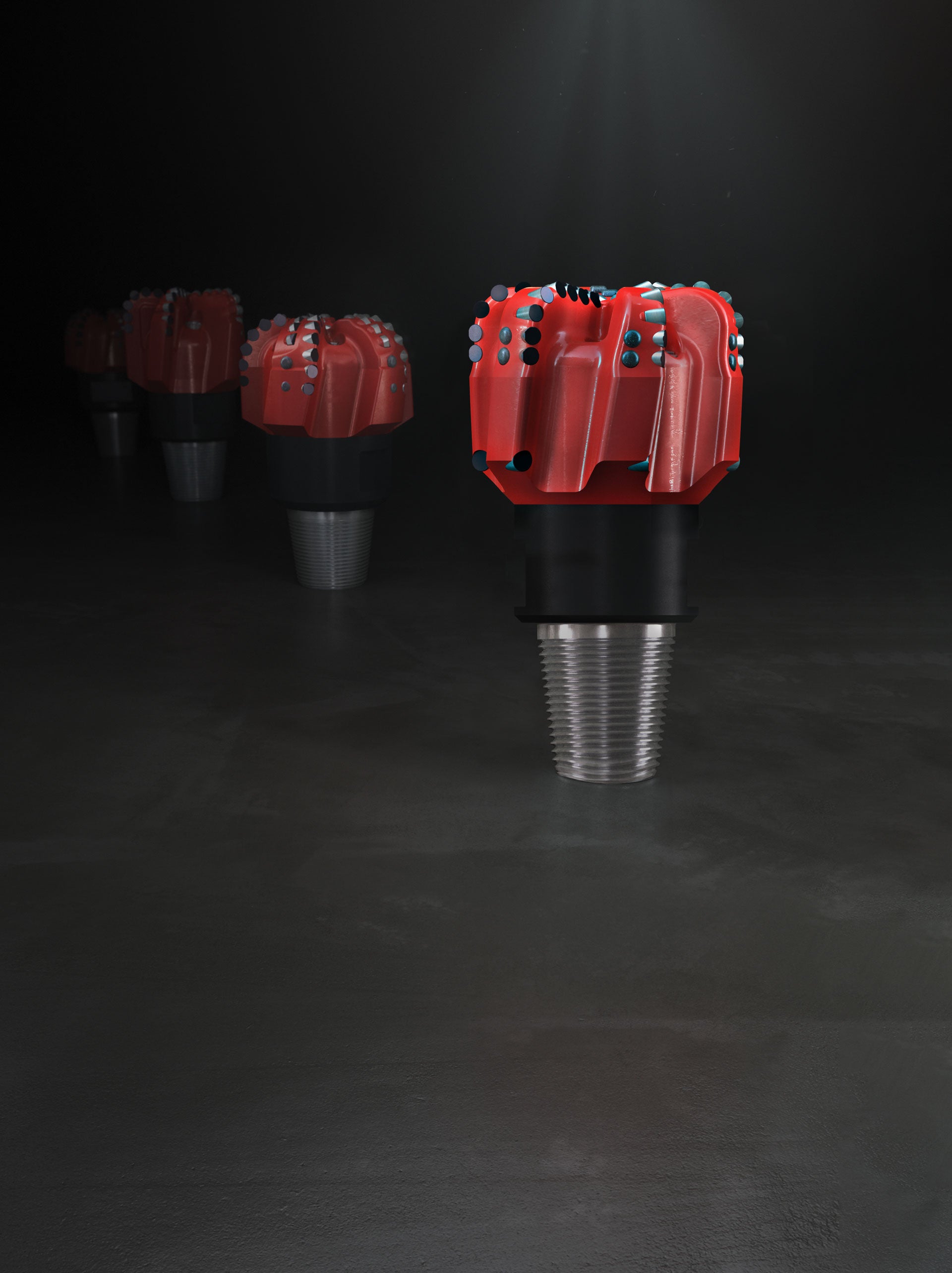 Fading lineup of red Tektonic Drill Bits