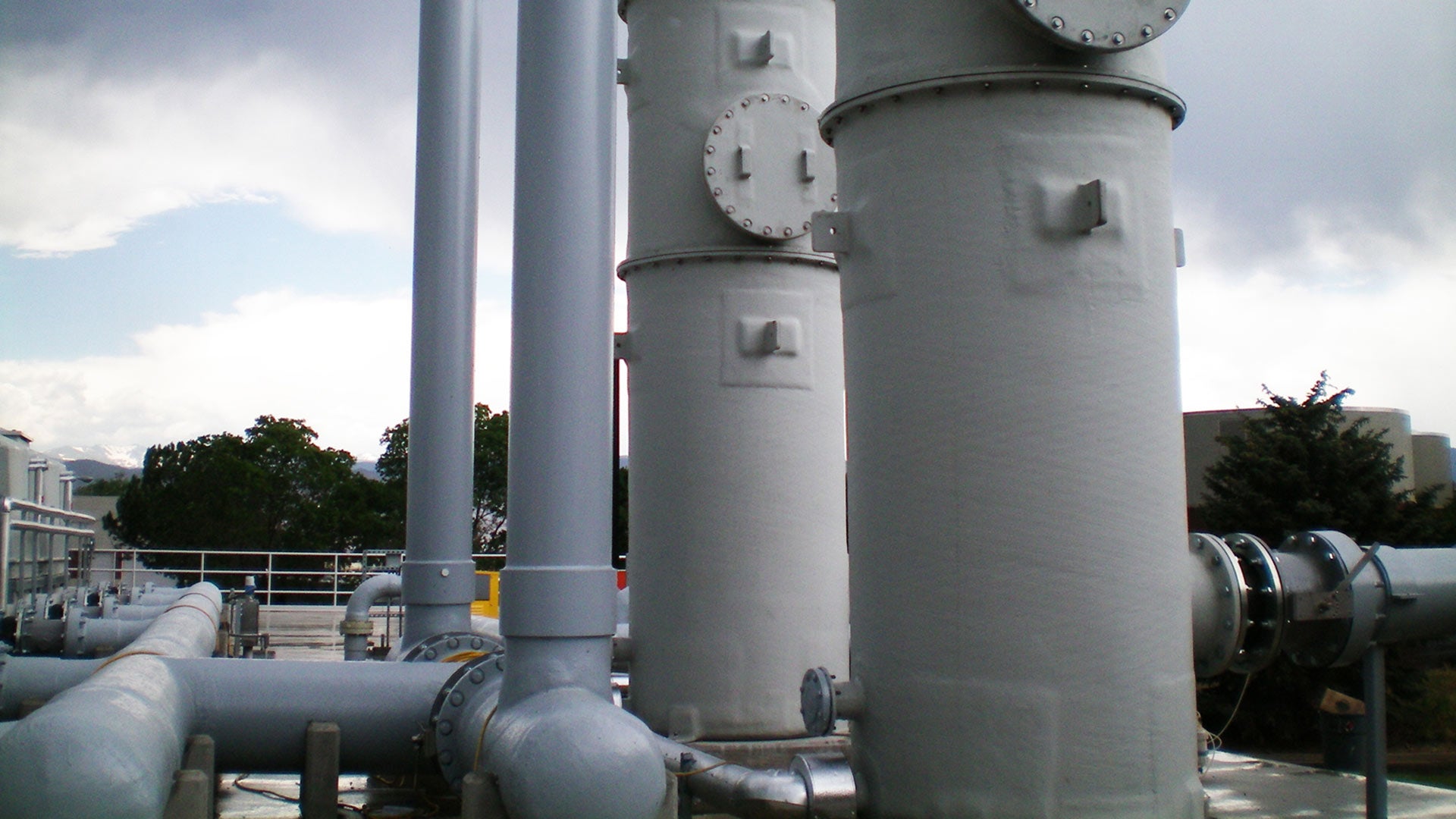 Features a detail closeup of Centricast Fiberglass piping