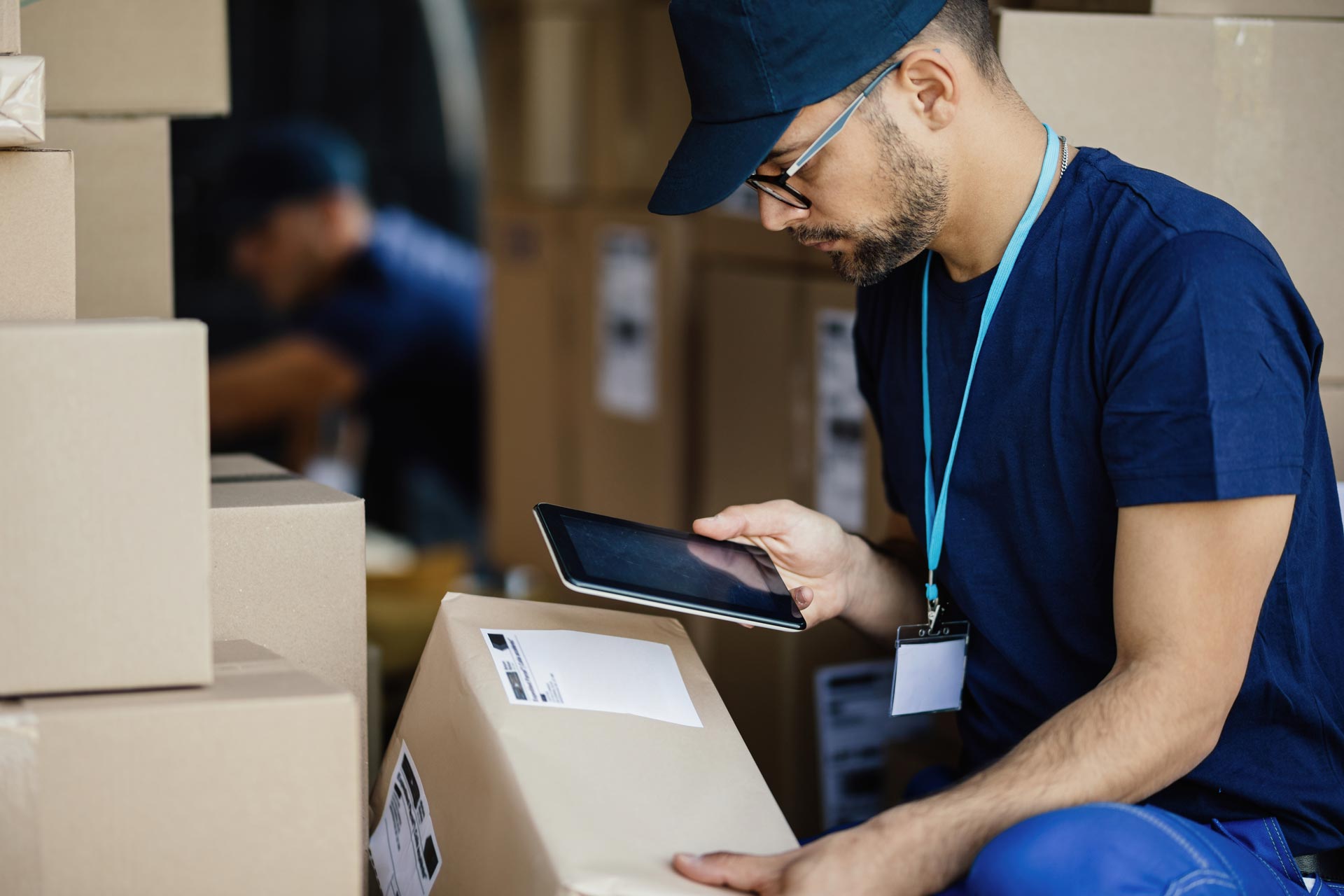 Warehouse worker scanning box