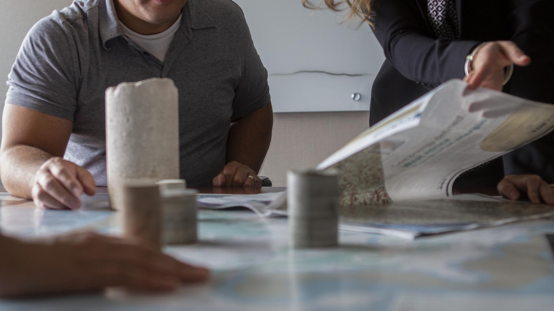 Associates around a meeting table