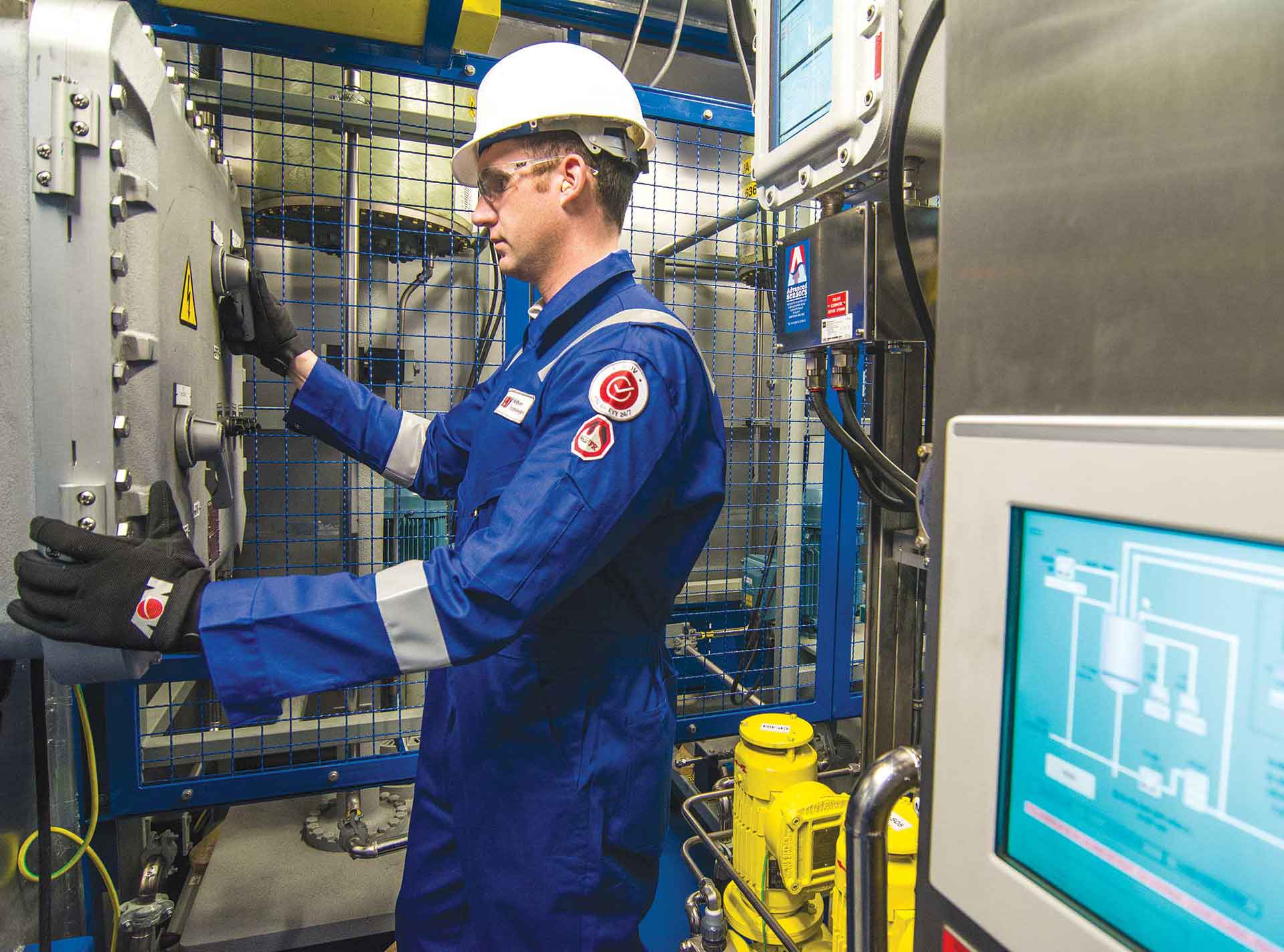A technician works on a water filtration system