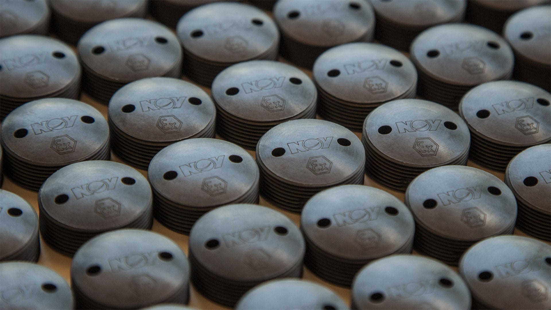 TracIDs are lined up on a table, ready to be fitted