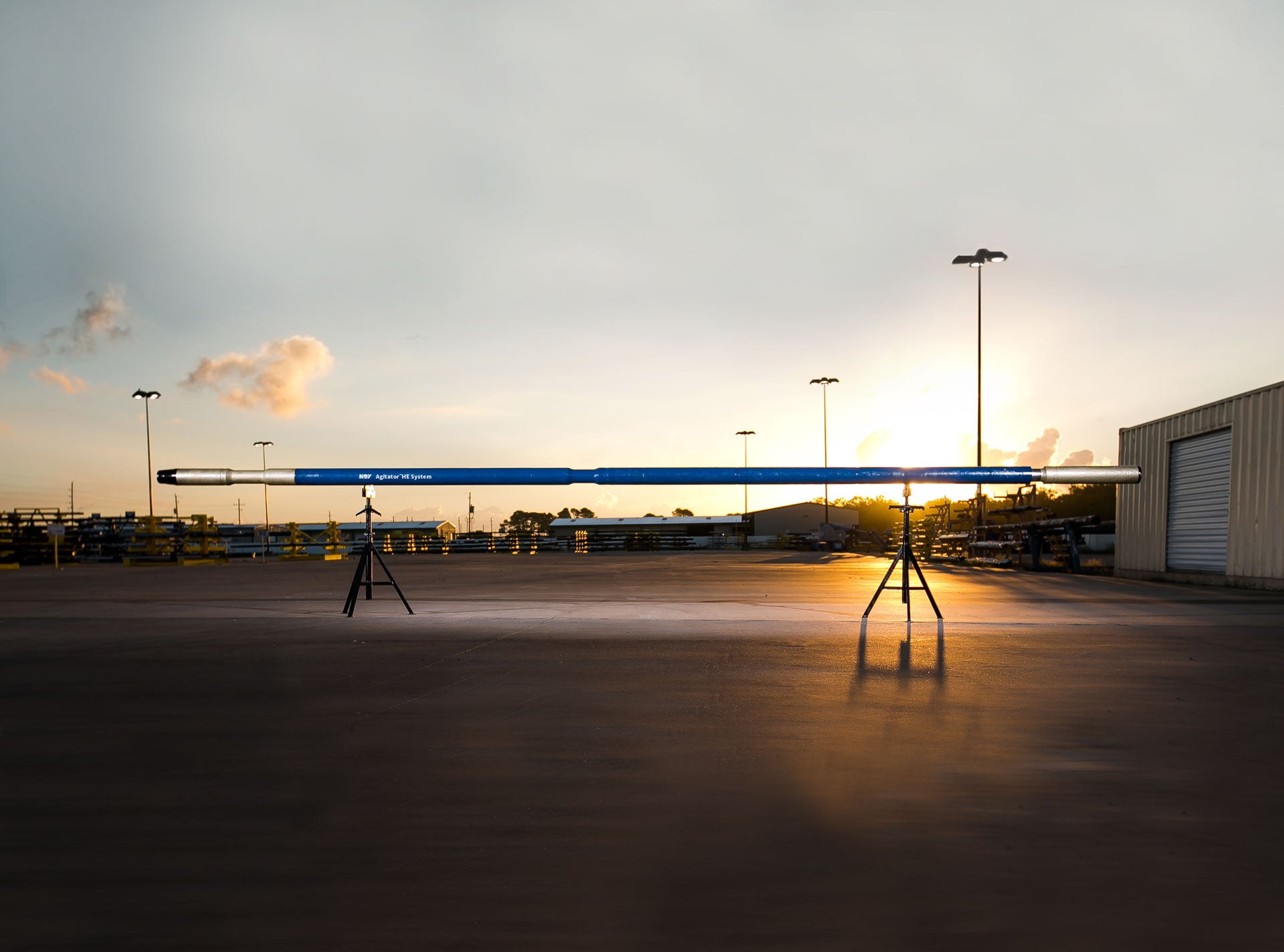 Agitator Fishing System on tripods with sunset in the background