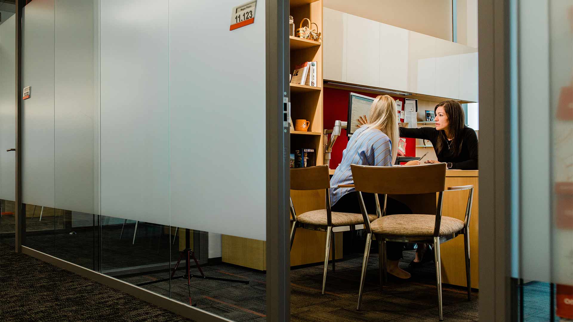 Megan meeting with fellow HR colleague