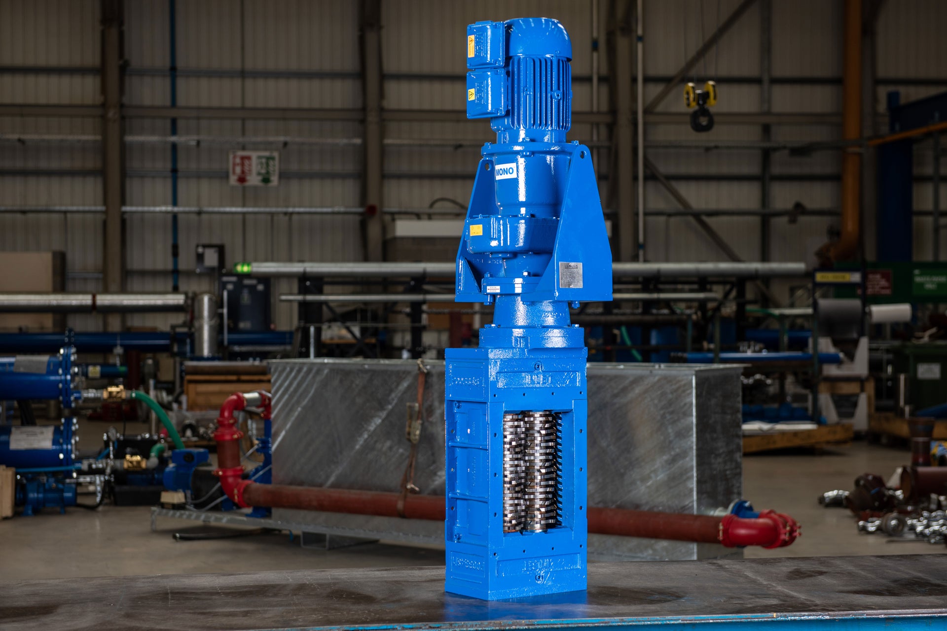 Wide shot of a Mono Series A Muncher in a facility