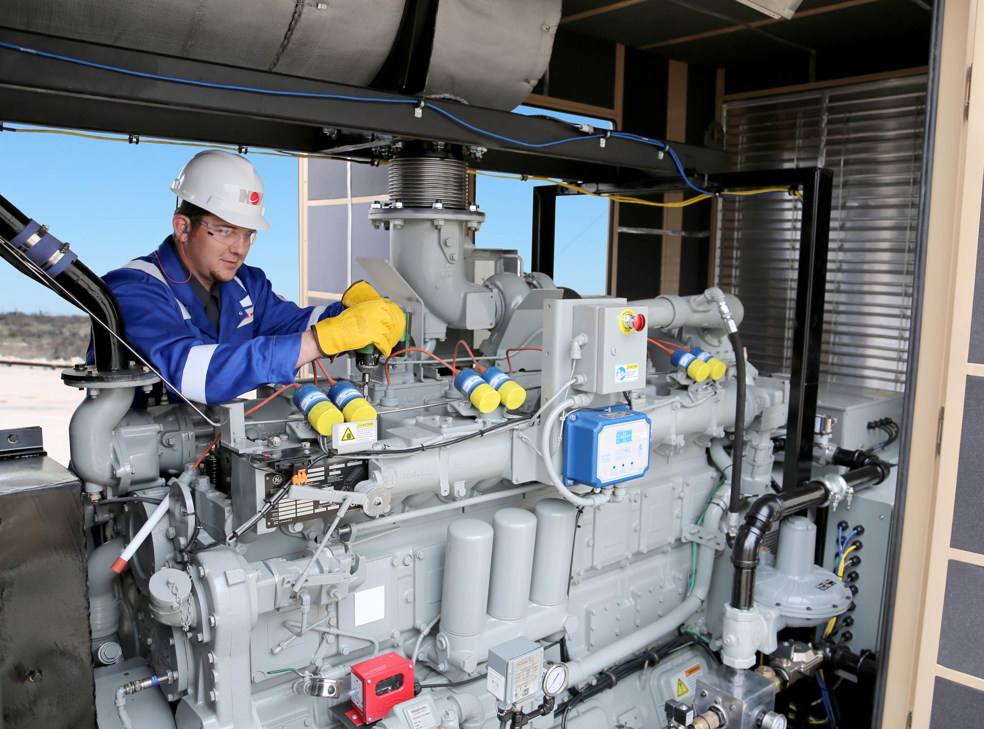 A technician works on a Diesel Generator Service and Spare Parts in Australia Pacific