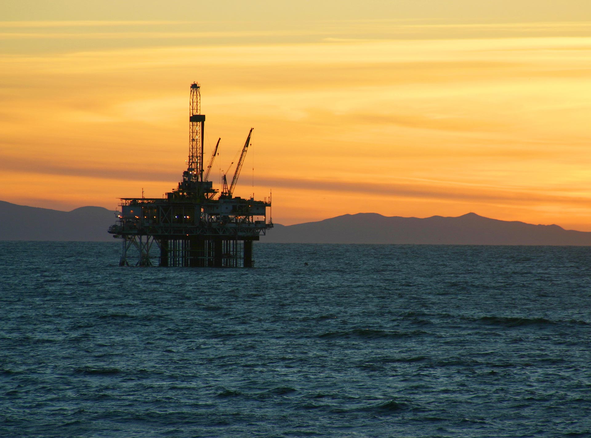 Offshore rig at sunset