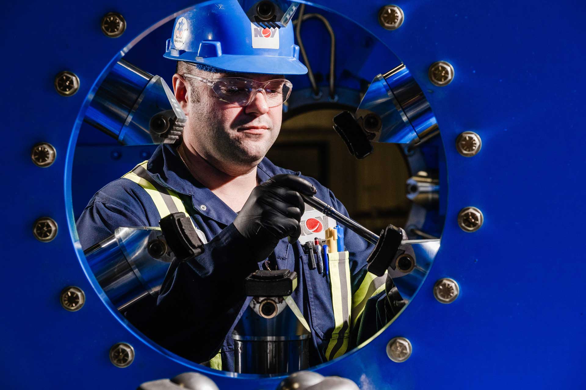 A technician works on a low-marking soft-shoe jaw