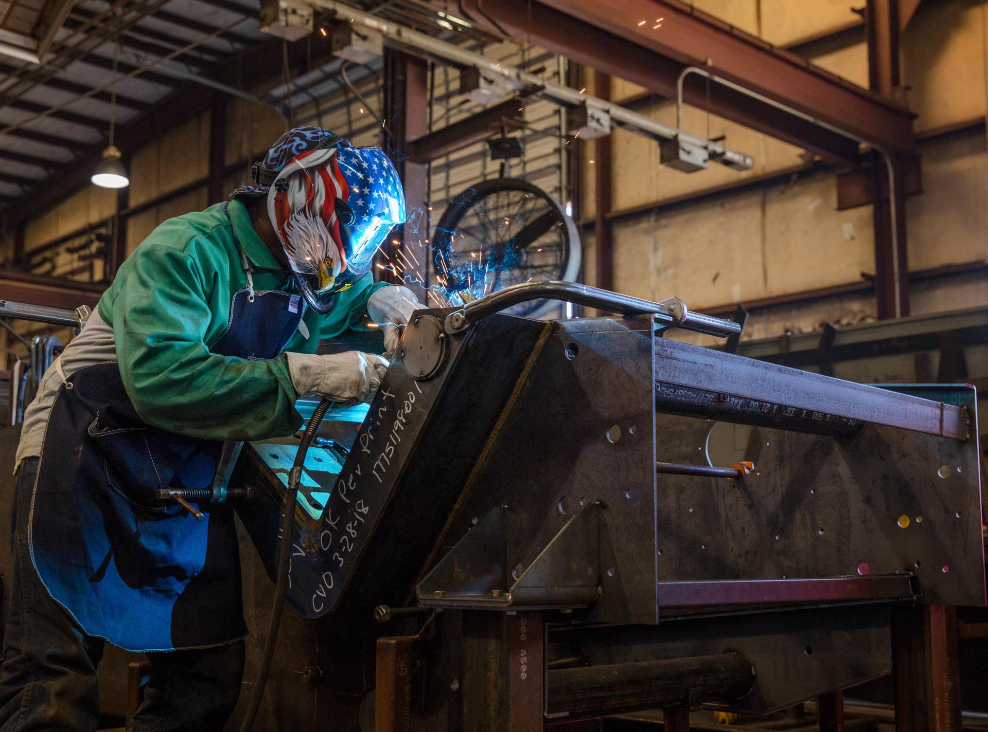 Welder working on Brandt equipment