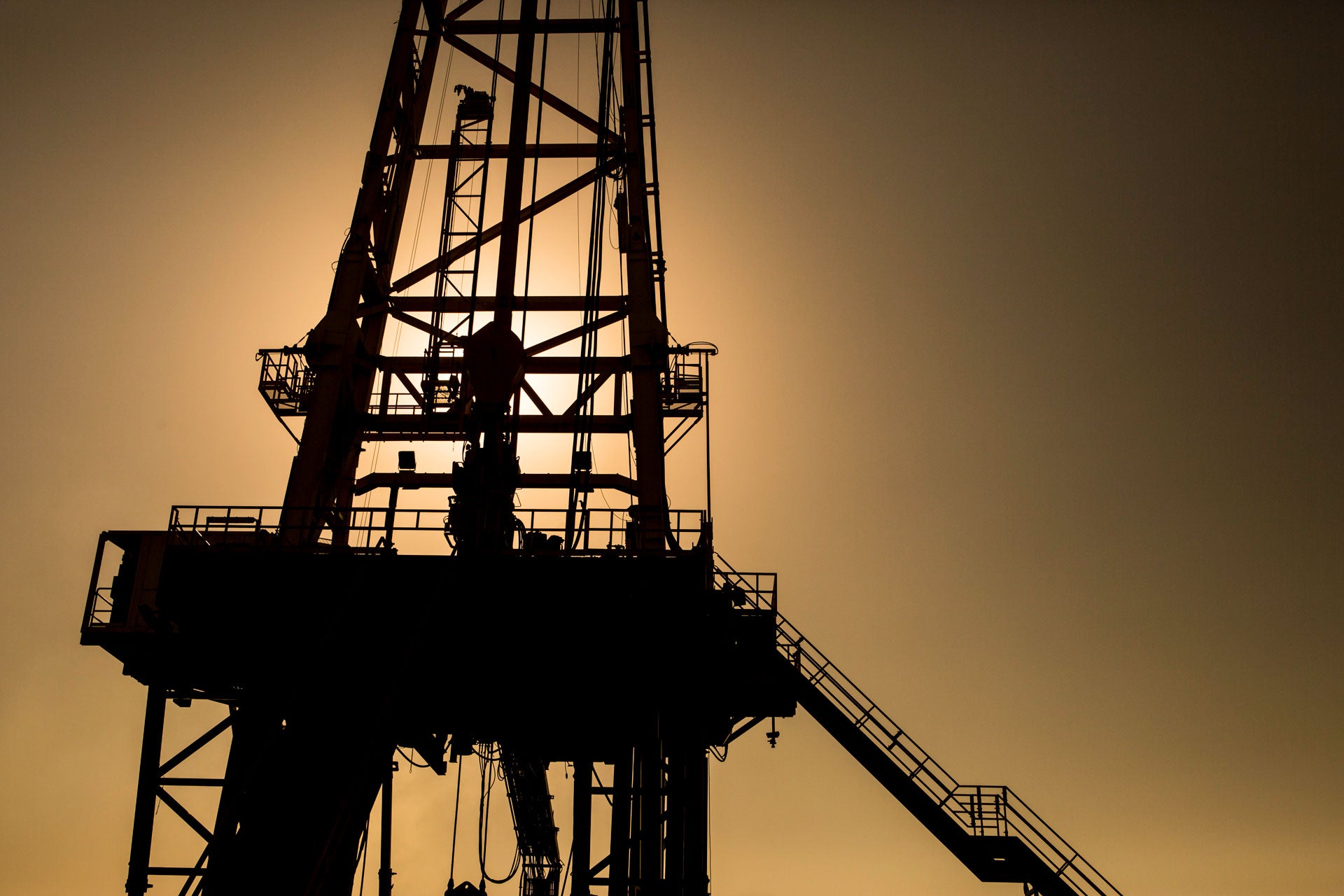 Close up of a land rig at dusk